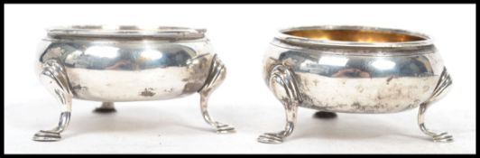 A matched pair of circular Georgian hallmarked sil