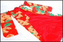A 20th century ladies Uchikake Japanese marriage robe, woven gold silk and silver and acrylic