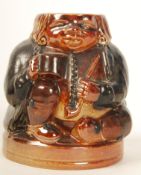 A Doulton Lambeth Toby Harry Simeon Inkwell modelled in a seated position smoking a pipe.