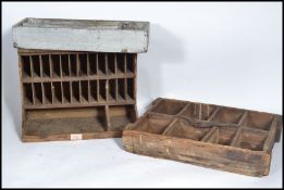 A group of three vintage 20th century scratch built wooden sectional tool trays, each of varying