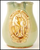 A Royal Doulton 'Greene King , Fine Suffolk Ales ' pub jug , having applied Greene King brewery