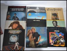 Vinyl Records A collection of vinyl Long Play LP records to include Elvis, George Benson, UB40,