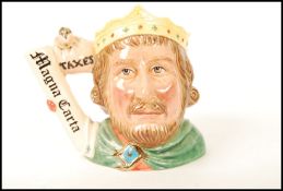 A Royal Doulton large character jug limited edition King John D7125 1033/1500. Measures 19cms