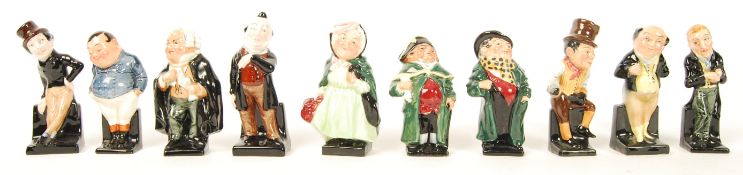 A group of ten Royal Doulton Dickensian figurines to include Pecksniff , Jingle , Buzfuz , Tony