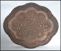 A stunning large possibly 19th century decorative fret pierced scalloped design shaped Islamic /