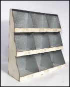 A vintage 20th century retro industrial galvanised nine section office file pigeon hole wall hanging