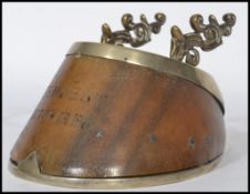 A 19th century Victorian desk top pen rest in the form of a taxidermy horse hoof having scrolled