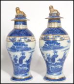 A pair of 19th century English pearlware pearl ware blue and white Oriental Chinese style vases