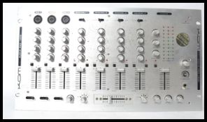 KAM - An audio pro 1500 mixer. Measures 26.5 cm hi