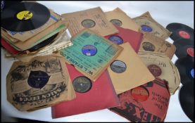 A collection of vintage 78rpm records dating from the early 20th century through to the mid 20th