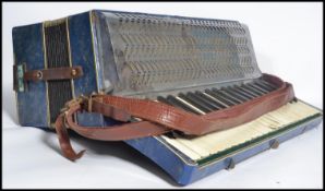 A vintage 20th century Apollo accordion musical instrument in original case. Measures 22 cm high and