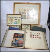 A collection of vintage stamp albums across 3 albums to include a collection of Victorian penny