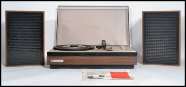 A retro Pye 1557 stereo record player / turntable, lift up perspex lid, three speed record deck