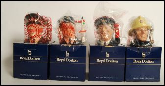 A group of four Royal Doulton 