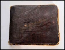 Autographs; a vintage part filled 1930's autograph book containing several period signatures to