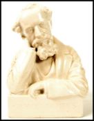 A Royal Doulton Lambeth Stoneware Bust of Charles Dickens, white glazed, early 20th century, Doulton