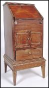 A late 19th century / early 20th century fall front mahogany drop well  bureau of small proportions,