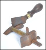 A 19th century Victorian leather working cutting tool. The blade stamped Tixon and Sons.