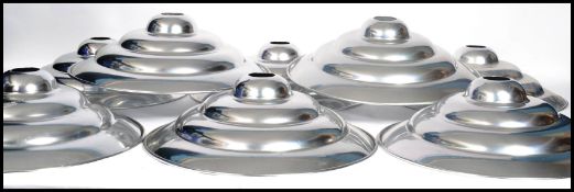 A set of eight vintage 20th century retro ' Space Age ' chrome ceiling pendant UFO type light shades