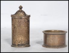 A silver hallmarked pepperette / condiment of lozenge form with finial top being marked for