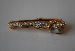 An 18ct gold and diamond figural brooch in the form of an intertwined couple. Marked 18k 750 tests