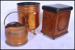A large 19th century Victorian copper coal / log bin raised on paw feet along with a copper coal
