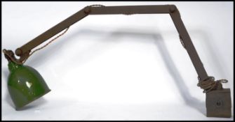 A vintage mid 20th century Industrial metal and enamel anglepoise desk lamp. Block flicker switch