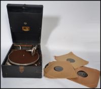 A vintage early 20th century HMV His Masters Voice cased portable gramophone with hinged lids and