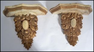 A pair of 19th century Victorian wall sconces / bracket shelves of scrolled form with serpentine