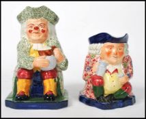 Two early 20th century Copeland Spode Toby jugs. One with floral jacket and one having a leaf