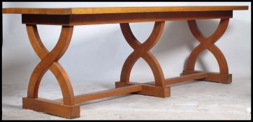 An exceptional Gothic Pugin revival triple footed large refectory dining table in solid oak.