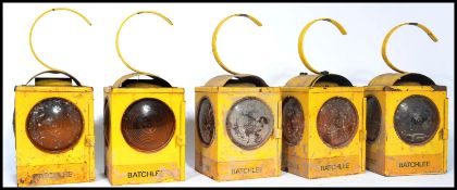 A group of 5 20th century Industrial Batchlee yellow painted metal road / railway 3 aspect hanging