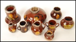 A group of miniature Royal Doulton items most having hallmarked silver collars to include Dickens