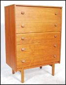 Symbol furniture - A retro 1960's teak wood chest of drawers comprising of 6 deep drawers raised