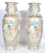 A pair of  large 20th Century Chinese famille rose floor standing twin handled vases - vase each