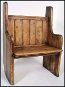 A good 19th century Victorian pine hall settle bench having pine slatted back rest with canted