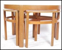 Nathan Furniture - A vintage 1970's teak framed trinity coffee table in the circles pattern having