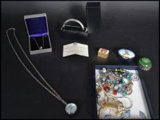 A collection of silver and costume jewellery items to include bracelets, to include a silver