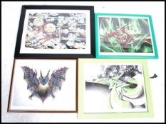 A group of four retro street art prints being framed and glazed. To include Cheo , Zayse Andy
