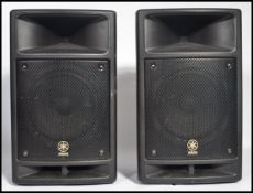 A set of Yamaha Stagepas 300 portable pa system speakers. Measures 48 cm high, 28 cm wide and 25