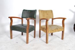 A set of 3 1930's fireside armchairs, each of low form with shaped elbow rests having spring