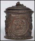 An 19th century Georgian tobacco pot jar. The table top box depicting classical scenes of battle