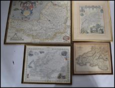 A collection of four framed and glazed 19th and 20th century maps to include a map of Europe drawn