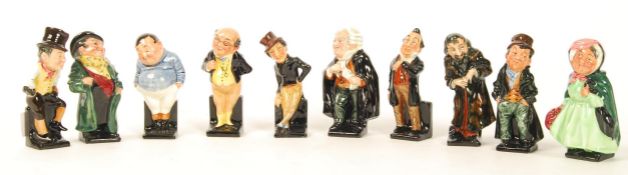 A group of ten Royal Doulton Dickensian figurines to include Fagin , Pecksniff , The Artful Dodger ,