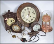 A group of vintage clocks dating from the 19th century to include a school / station clock , glass