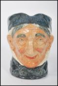 A Royal Doulton character jug entitled ' Toothless Granny '. Doulton designer Harry Fenton 1935 -