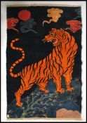 An early 20th century Tibetan tiger rug.  The blue ground with large central tiger  chasing swirling