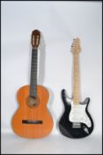 A vintage 20th century Ludo electric guitar and an Lenora acoustic guitar musical instrument.