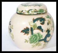 A collection of Masons Chartreuse pattern ceramics to include ginger jars of varying sizes and a