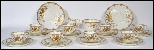 A 19th century Swansea ceramic tea service having a gilt painted leaf foliage design.